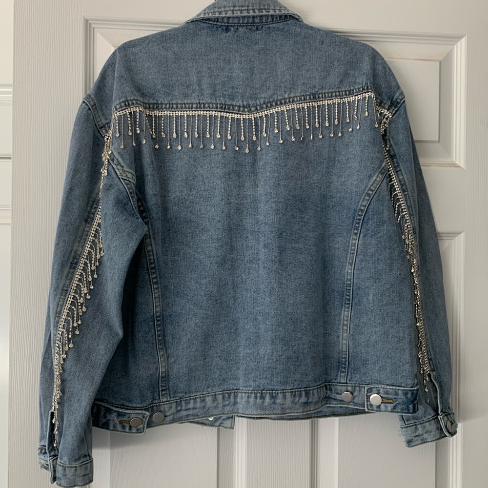 Denim jacket with rhinestone trim